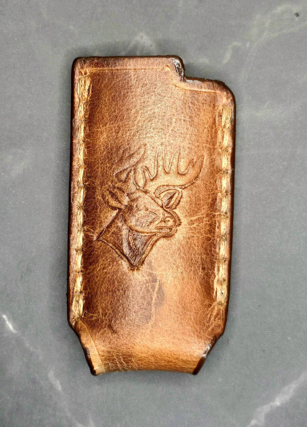 Veg-tan leather lighter case for bic lighters with Deer picture.