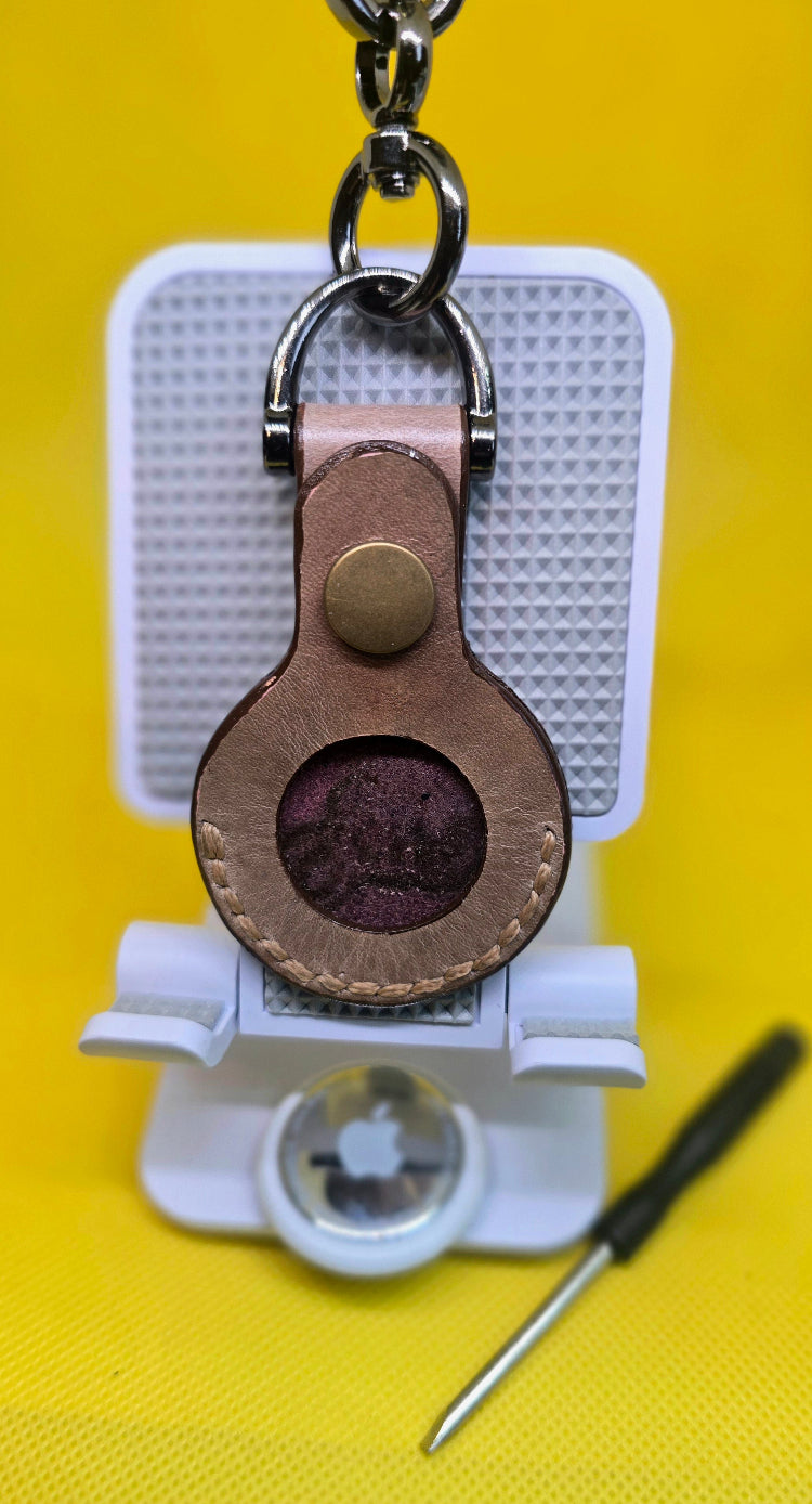 Brown, hand crafted veg-tan leather apple airtag case 