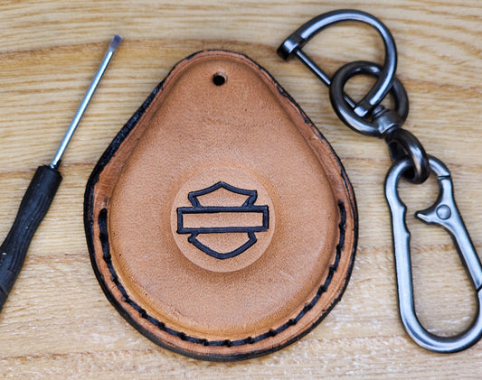 Front view of a brown, antique finish premium vegetable tanned leather Harley Davidson key fob case with keychain and mini screwdriver.