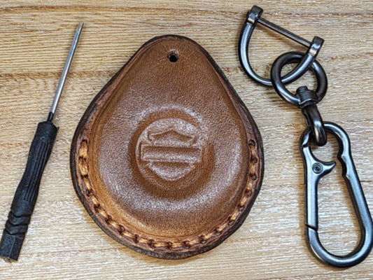 Brown vegetable tanned leather Key-fob case for Harley Davidson motorcycles with keychain and screwdriver.